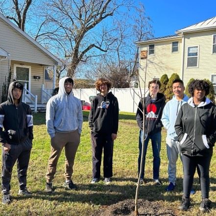 Re Leaf Cville – High school students Installing free trees for homeowners in accordance with grant funding.