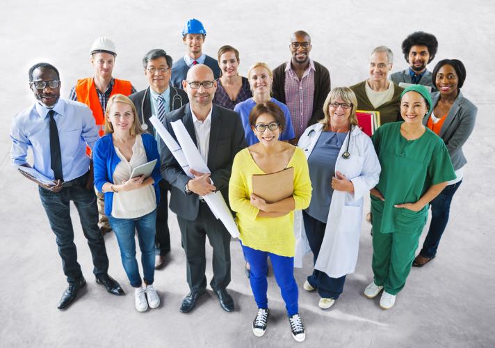 People in a variety of job uniforms